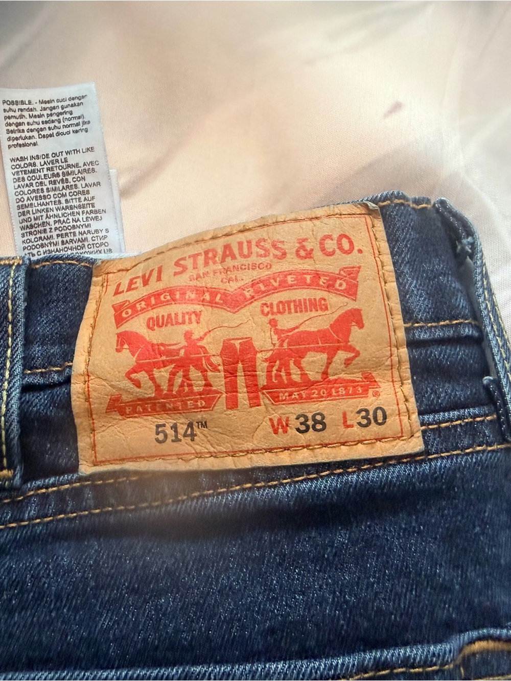 Levi's 514 Slim Straight Jeans in Dark Blue with Tan Patch